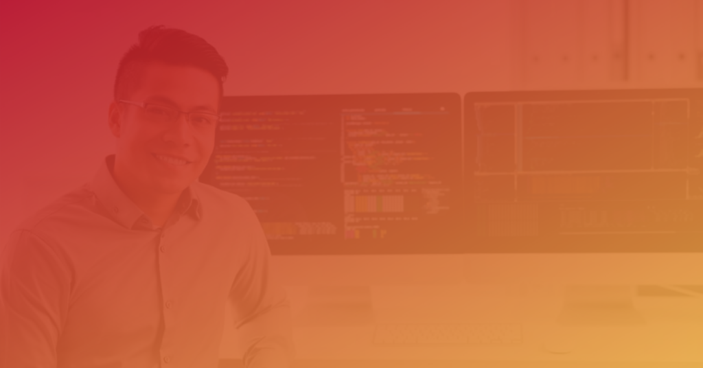 Man smiling in front of computer screens with code, red-orange overlay
